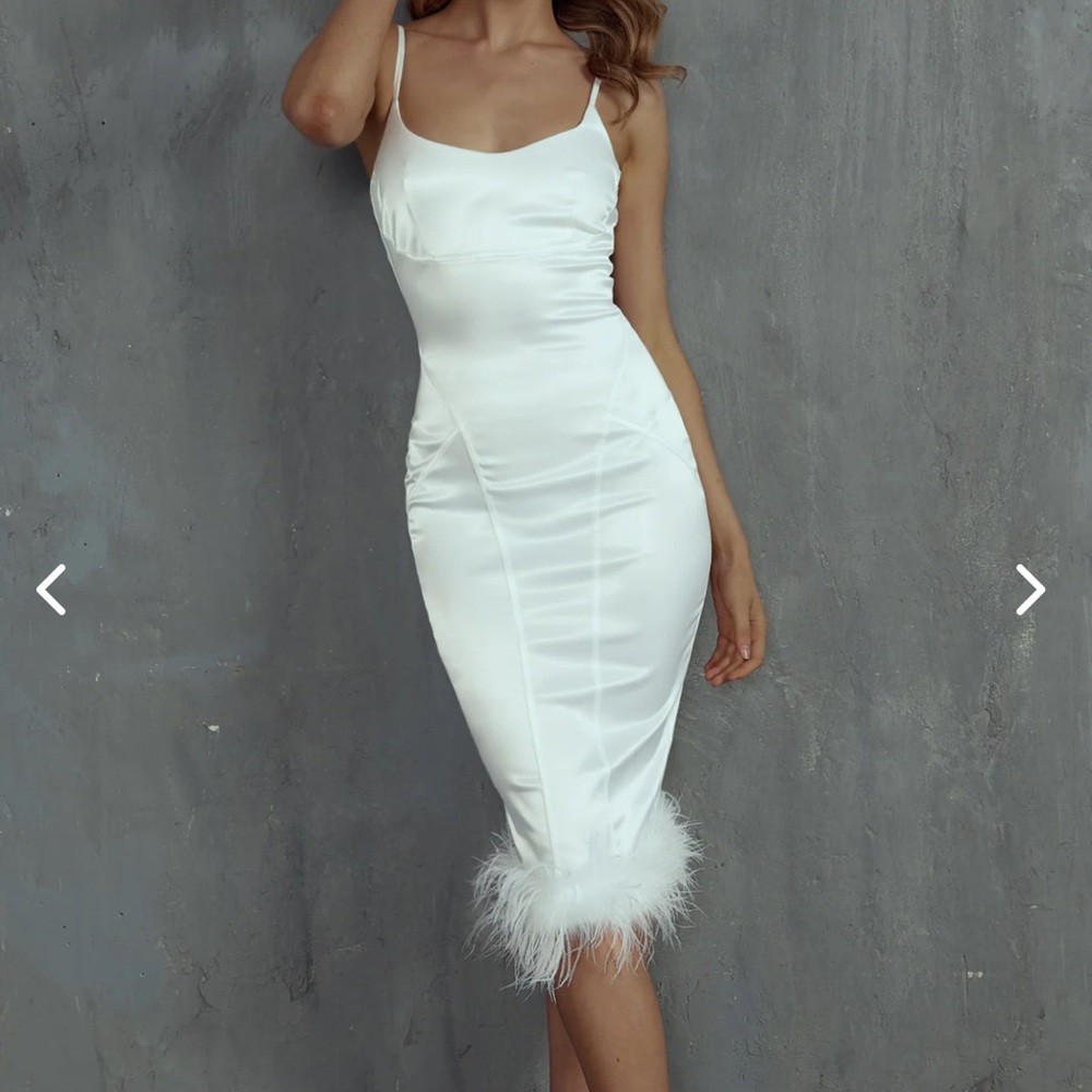 Bodycon dress with feather trim!